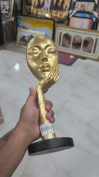Gold Abstract Face & Hand Sculpture with Black Base