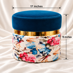 Decoreway luxury blue velvet floral ottoman stool showing 17-inch diameter and 15-inch height with gold-tone accent on white satin fabric.