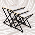 Luxury white marble effect nesting side tables set of 3 with gold veining, square tops and modern black metal X-shaped frames by Decoreway.
