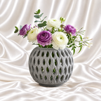 5.5-inch stone grey openwork decorative vase with white and purple floral arrangement for modern home decor.