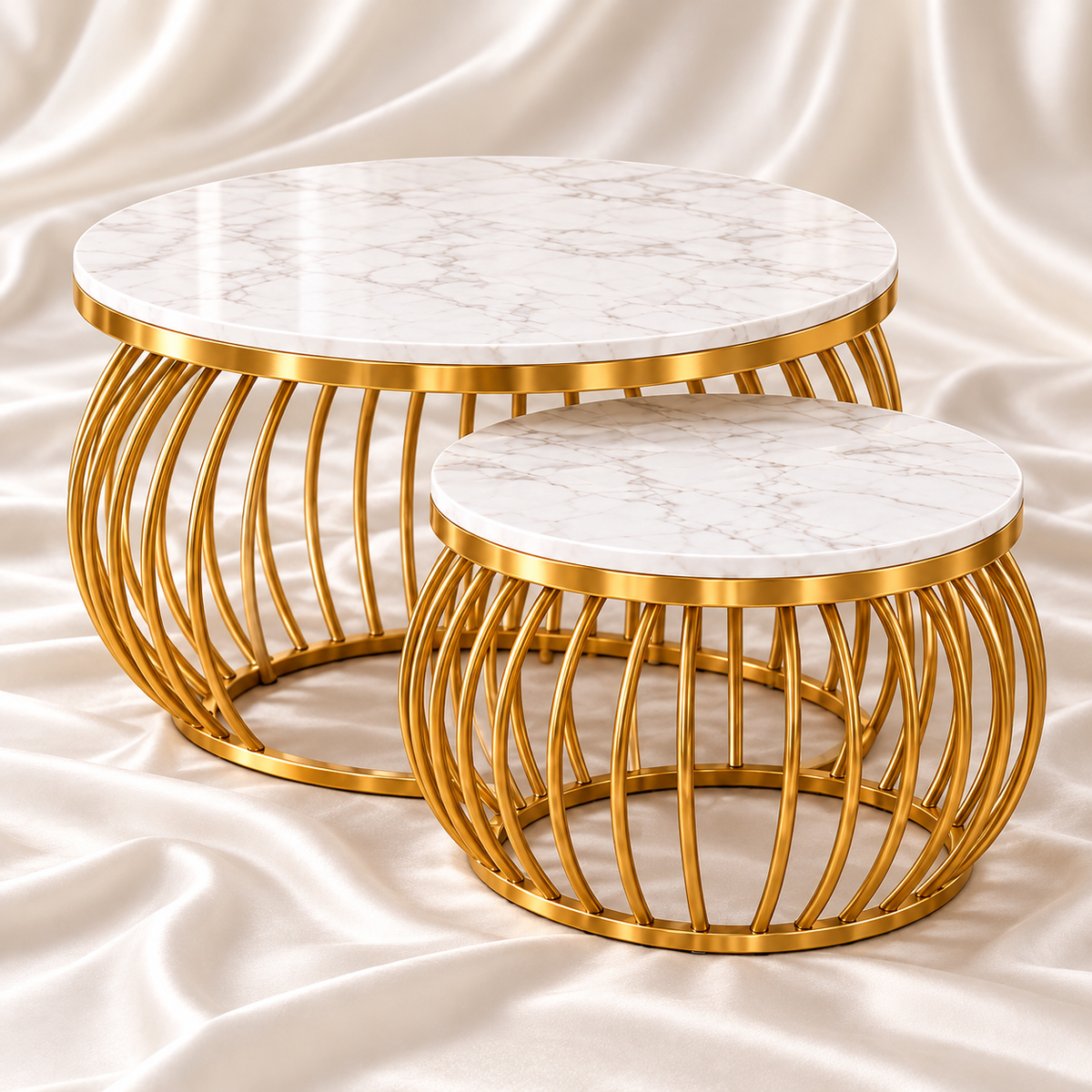 Luxury gold round nesting coffee tables set of 2 with white marble-effect tabletops, curved gold metal bases and elegant satin background – Decoreway