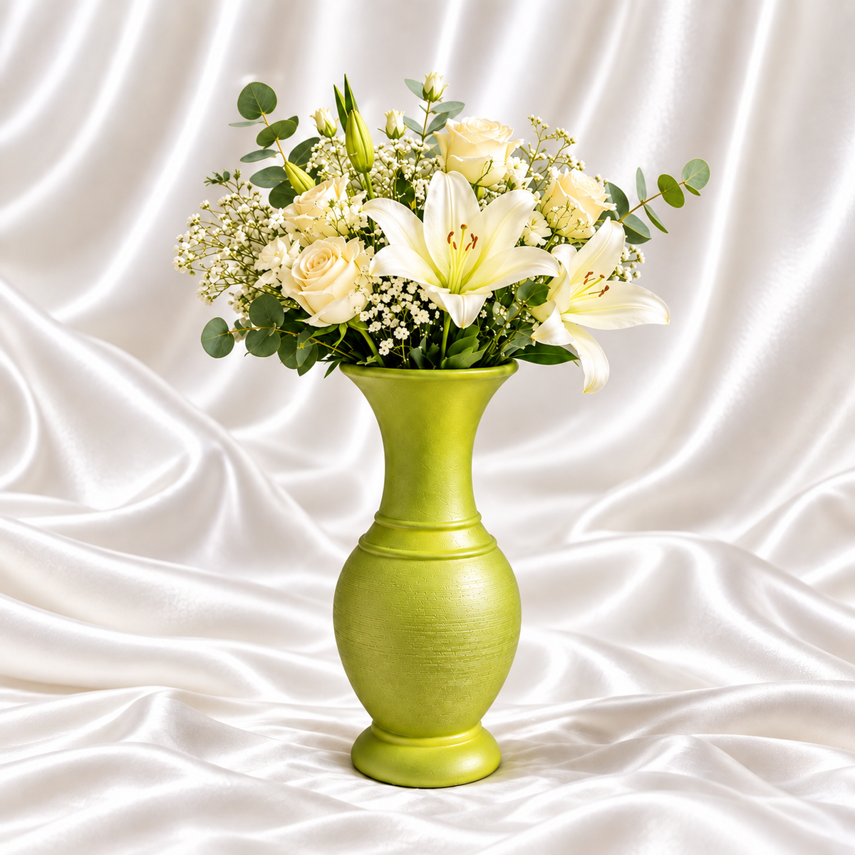 10-inch lime green decorative vase with a textured body and white floral arrangement on a white satin background.