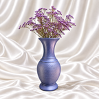 10-inch periwinkle blue decorative vase with a textured body and purple flowers on a white satin background.