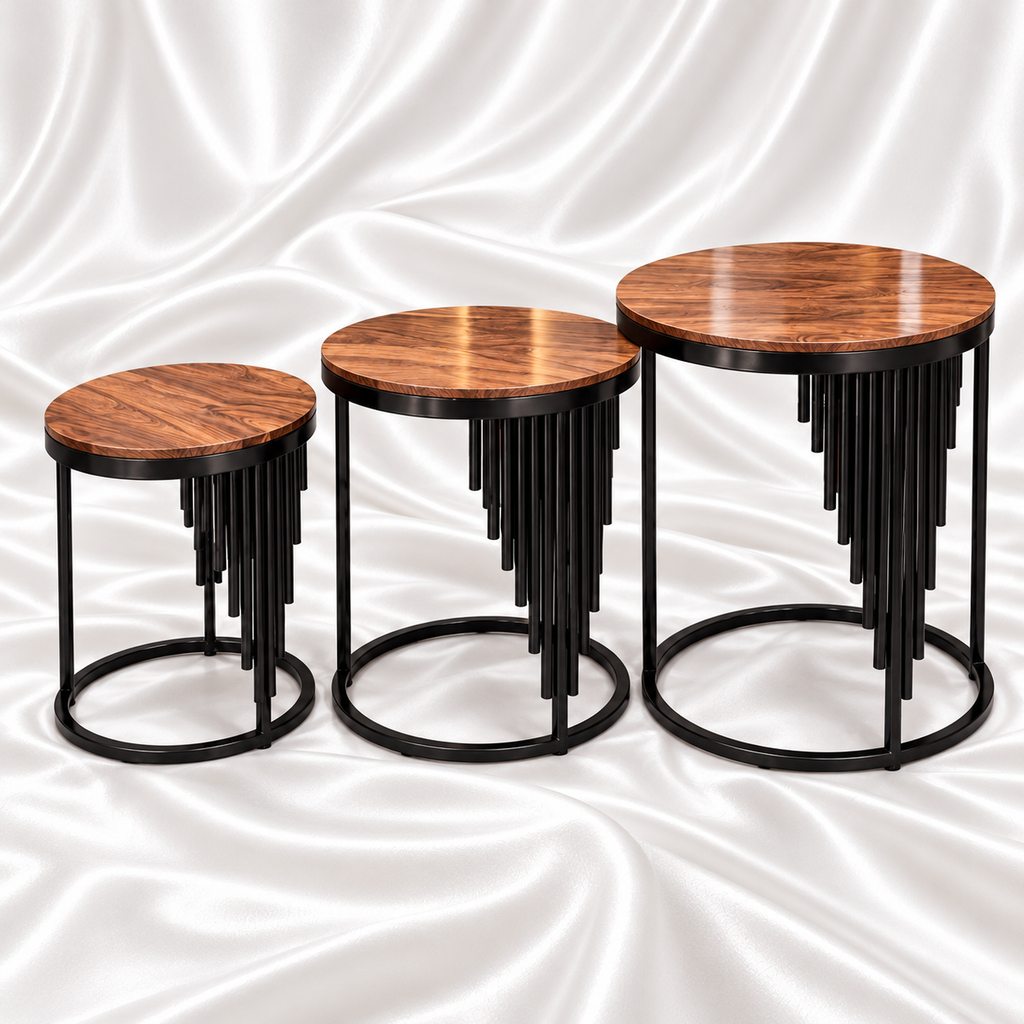 Three round brown woodgrain nesting tables with black metal frames, cascading rod details and circular bases on white satin fabric.