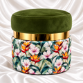 Luxury olive green velvet ottoman stool with gold accent band and tropical floral fabric base on white satin background – Decorway