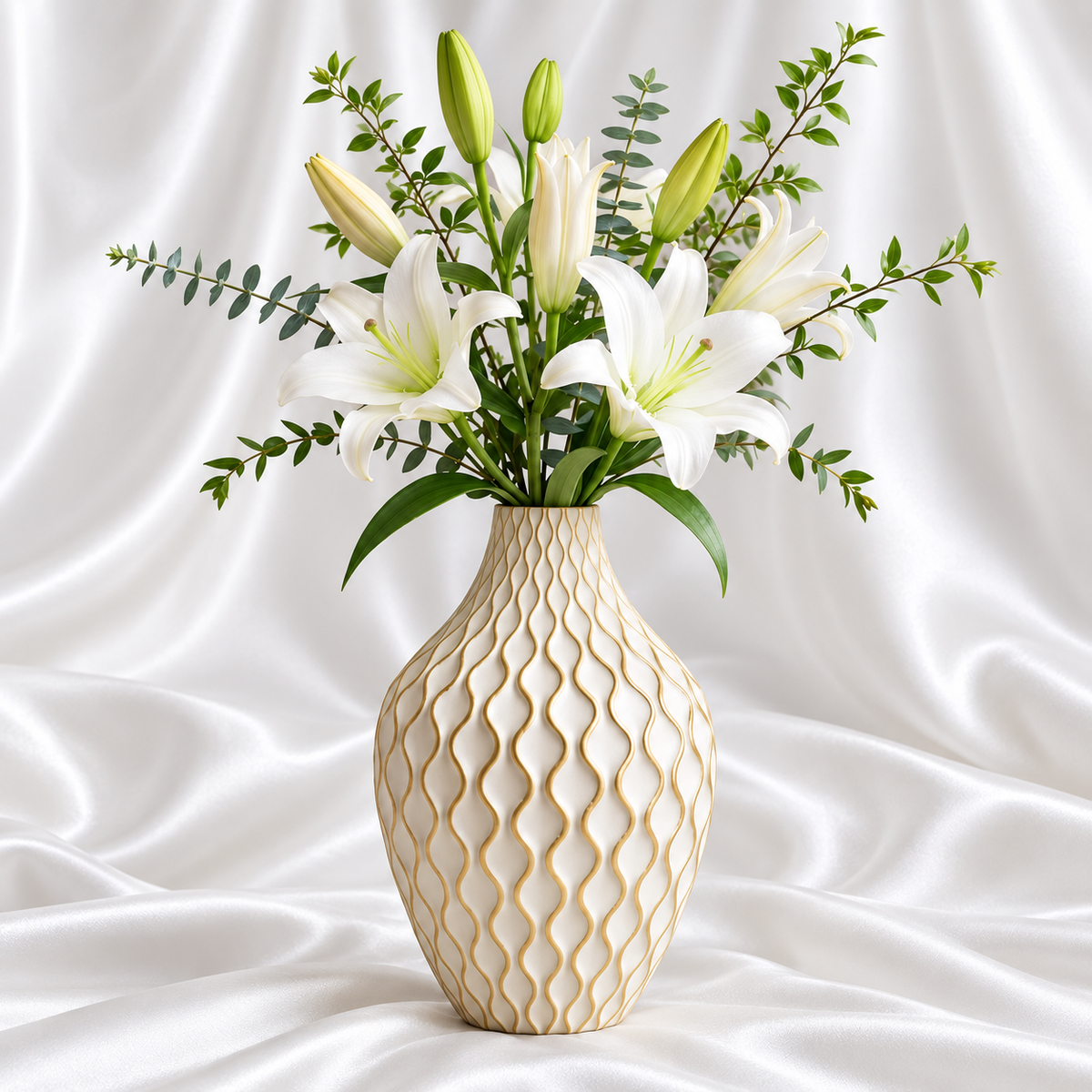 Modern white decorative flower vase with gold wave pattern and white lily arrangement