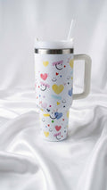 Happy Hearts & Smiles Print Tumbler – Large Stainless Steel Cup with Handle & Straw